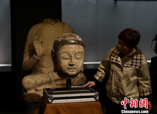 星云大師捐贈的北齊釋迦牟尼造像佛首29日回到河北 李茜 攝