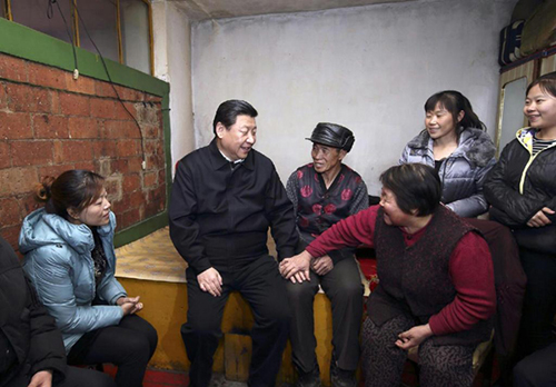 2014��1��26��������ƽ����ӛ���M�֘I(y��)���y������ؔ����ͬ�Ϲ�һ���˴�ϥՄ����(�DƬ��Դ�����A�W(w��ng))