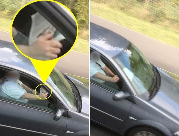 英魯莽司機(jī)交通高峰期被拍到開(kāi)車(chē)時(shí)看報(bào)紙 英魯莽司機(jī)交通高峰期被拍到開(kāi)車(chē)時(shí)看報(bào)紙