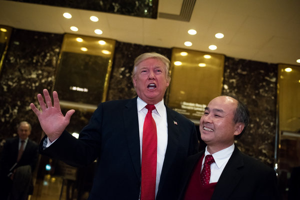 圖:特朗普和孫正義。美國(guó)《紐約時(shí)報(bào)》網(wǎng)站)